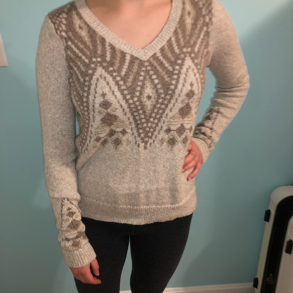 Tan sweater with brown design